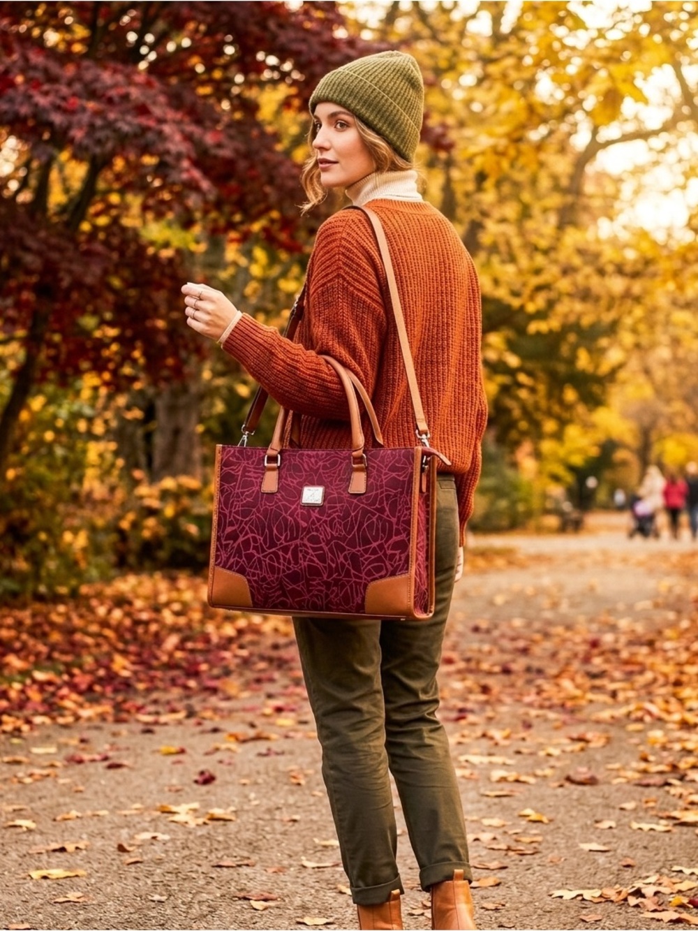 Diane Von Furstenberg Wine Pink Abstract Logo Tote with Tan Trim.
